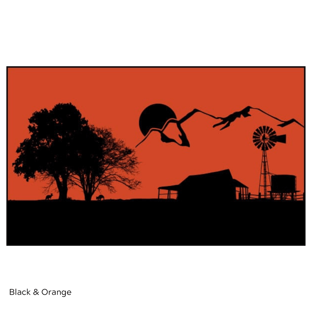 Black and orange outdoor mat design with silhouetted trees, mountains, windmill, and cabin for camping or beach use