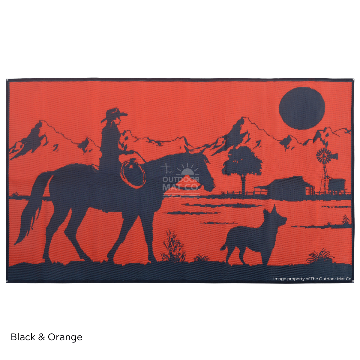 Black and orange recycled outdoor mat with cowboy, horse, dog, and mountain scenery for camping or picnics