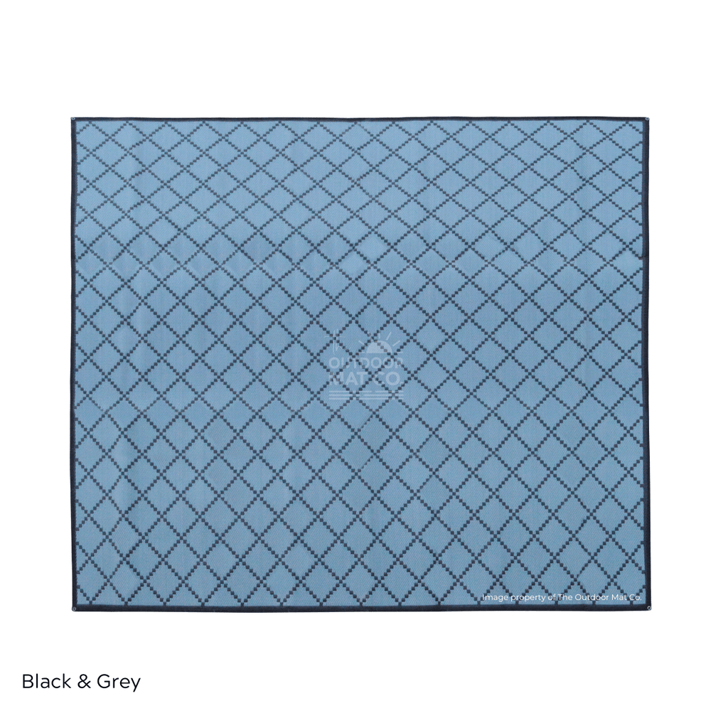 Blue outdoor mat with black diamond pattern, eco-friendly recycled design for camping, beach, or picnics