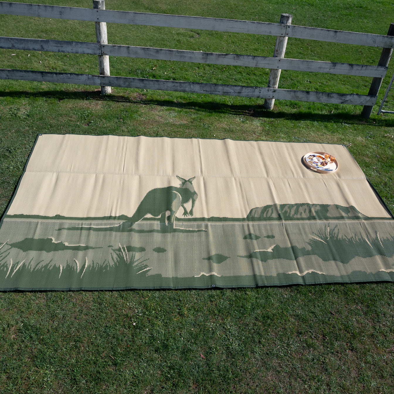 Eco-friendly outdoor mat with kangaroo design, perfect for picnics on grass, made from recycled materials