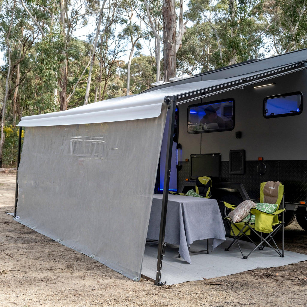 Recycled outdoor mat under caravan awning, perfect for camping, picnics, and beach days