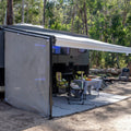 Recycled outdoor mat under caravan awning, perfect for camping, picnics, and beach days