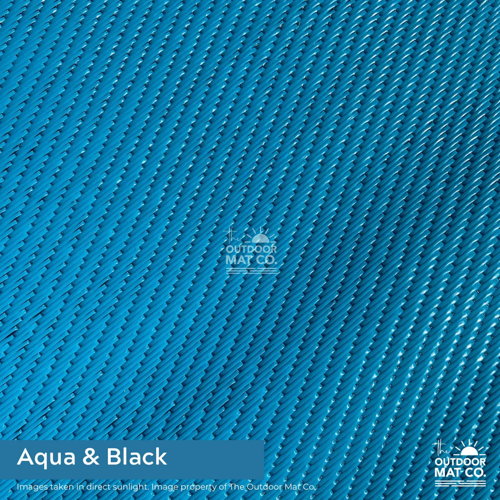 Aqua & black recycled outdoor mat with woven texture, ideal for beach, camping, picnics, and caravans.