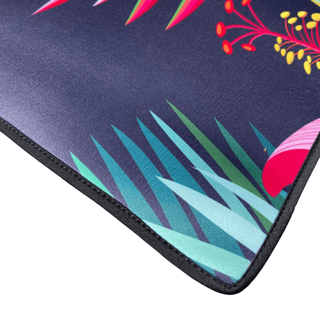 Vibrant tropical print outdoor mat with recycled material, ideal for beach, camping, picnics, and caravans.